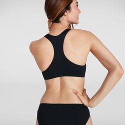 Speedo bikini de entrenamiento para natación negro combinado con naranja y magenta.